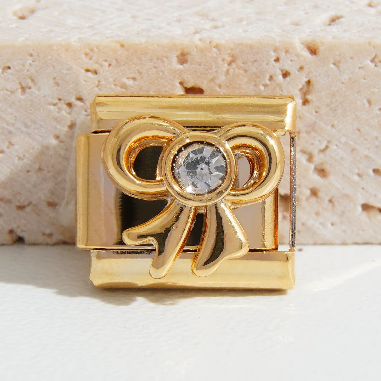 Gold Bow and Stone Charm